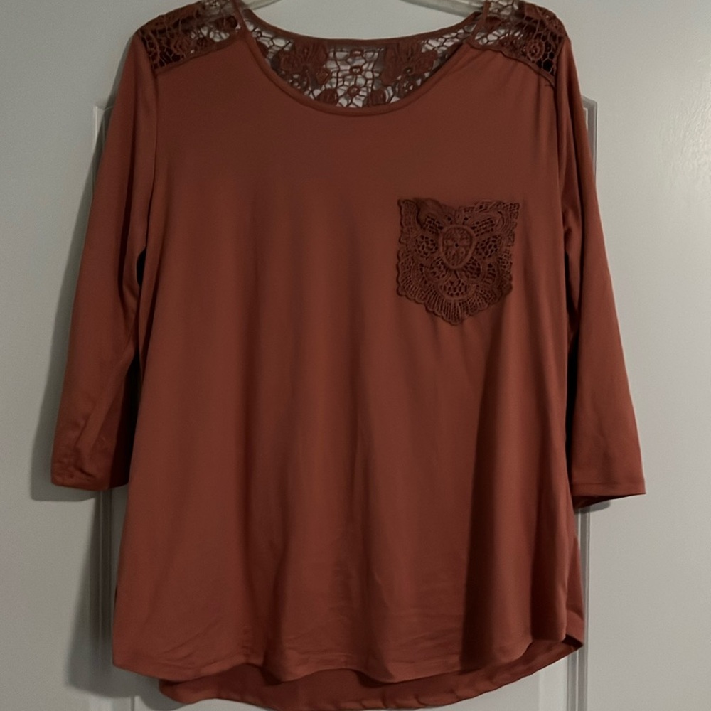 Riley and James 3/4 sleeve top with crochet lace detail.